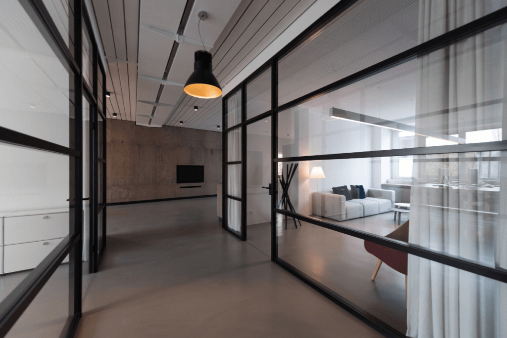 Corridor with glass office partitions in a modern style