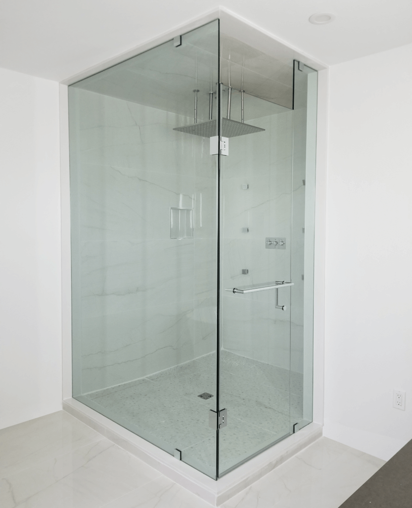 Corner shower with glass doors
