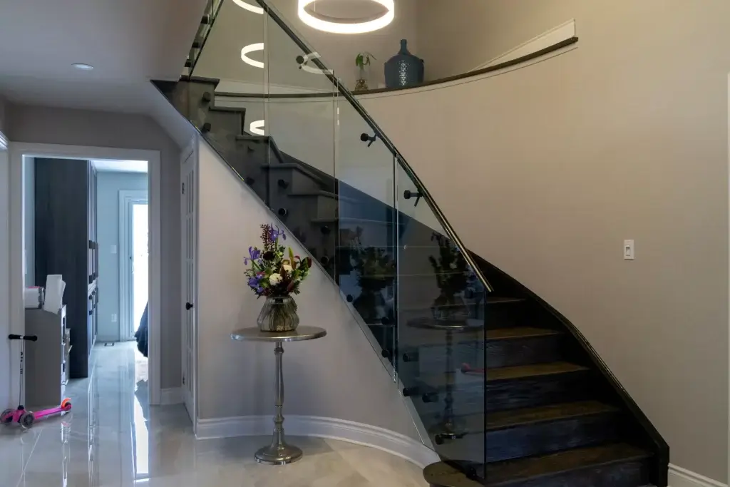Spiral staircase with transparent glass railings