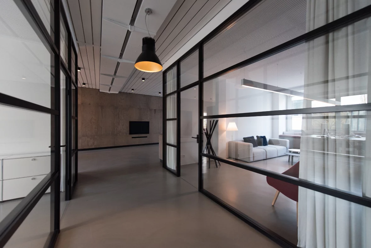 Hall with glass office partitions in a modern style